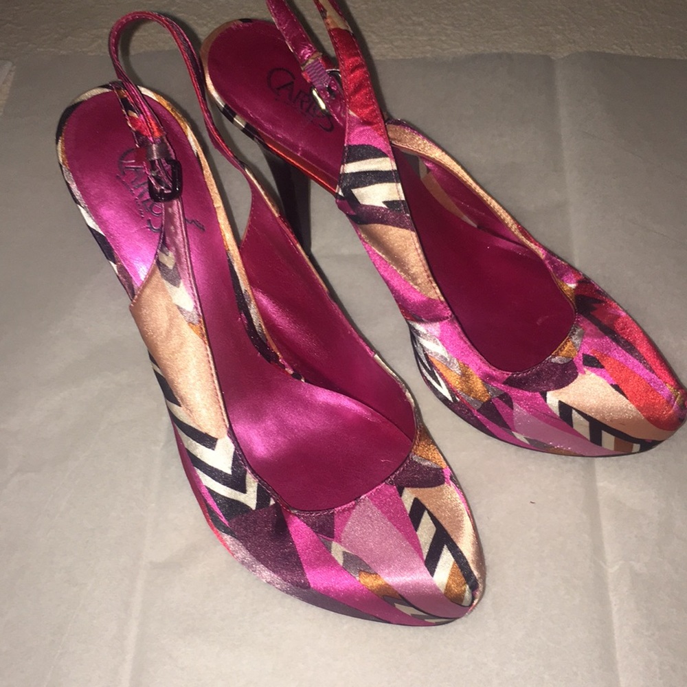 Carlos Santana sling back platform heel.